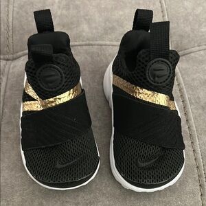 Kids Black and Gold Slip-On Sneakers